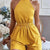 eprolo Yellow / XS Kort Jumpsuit med halterneck och bar rygg